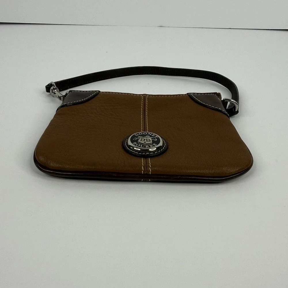 Dooney & Bourke Brown Pebble Leather Wristlet Medallion Logo Zipper